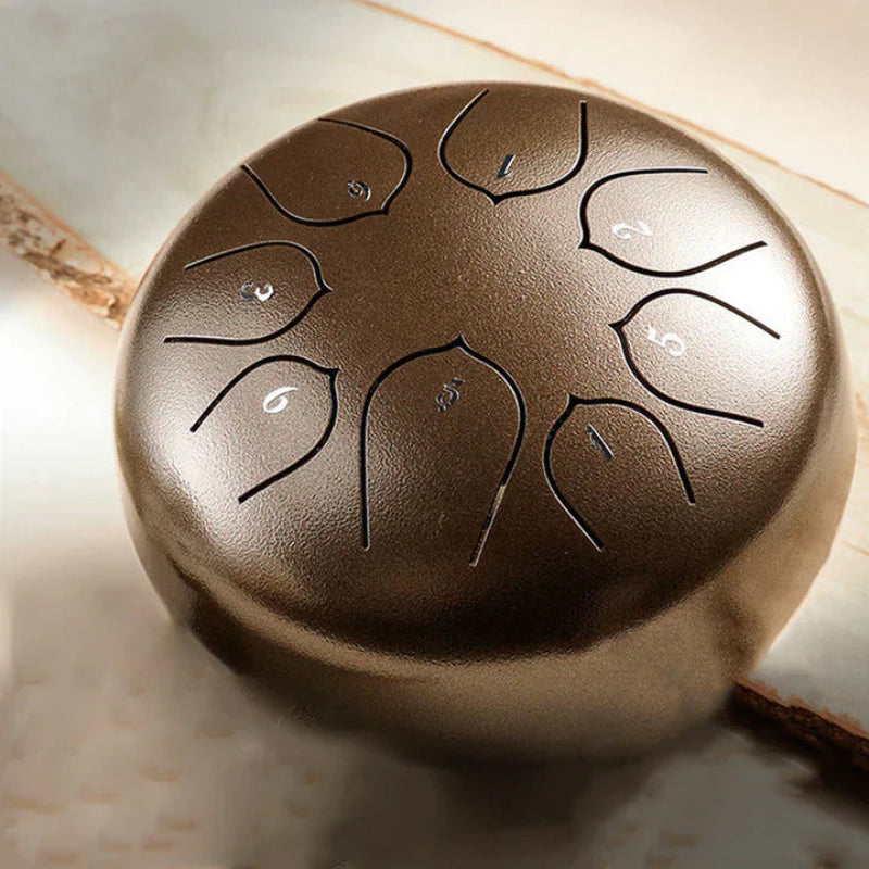 Mini-Trommel mit integrierten beruhigenden Klängen 